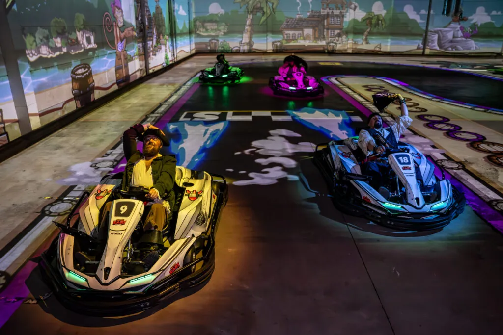 BattleKart karts in action on a lit track