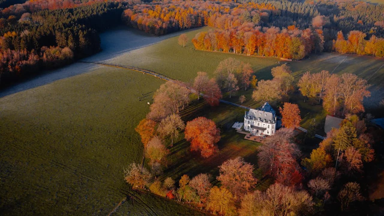 Château de la Louveterie from above, autumn light